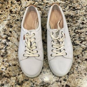 Women’s 42 (11) white lace up shoes. New without tags. Never worn.
